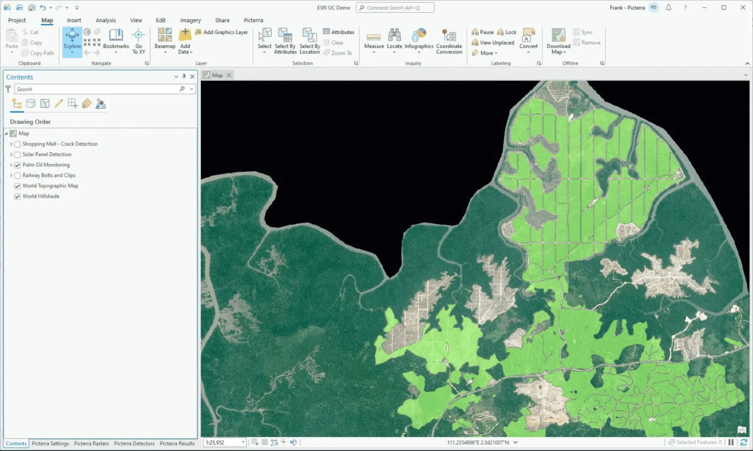 Screenshot of ArcGIS software interface showing land cover mapping with highlighted palm oil plantation areas