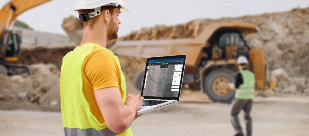 Photograph of Picterra being used on a laptop in a mining environment
