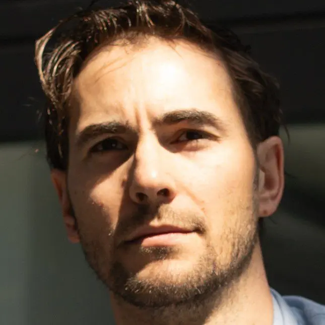 A photograph of Süddeutsche Zeitung reporter Ben Heubl
